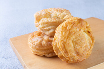 3 cheese puff pastry, displayed on gray background