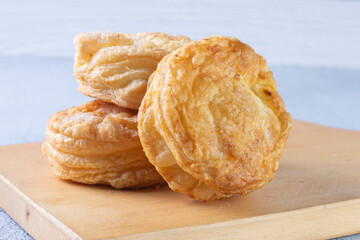 3 cheese puff pastry, displayed on gray background