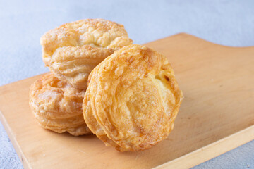 3 cheese puff pastry, displayed on gray background