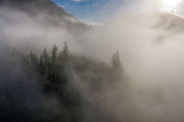 Fototapeta na wymiar Flying my drone around a foggy sunrise in the Washington mountai