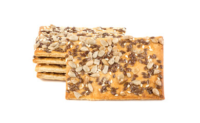 Cookies with sunflower and flax seeds isolated on white background. Fitness nutrition crackers.