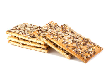 Cookies with sunflower and flax seeds isolated on white background. Fitness nutrition crackers.