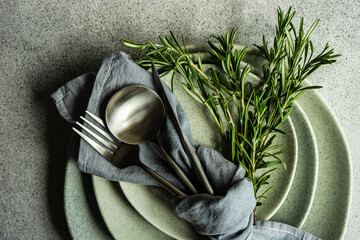 Minimalistic table setting with rustic towel