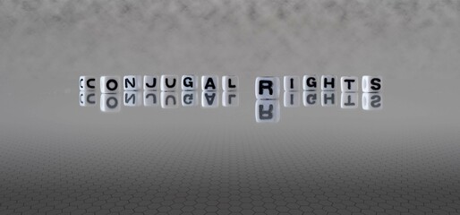 conjugal rights word or concept represented by black and white letter cubes on a grey horizon background stretching to infinity