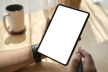 Young woman using digital tablet. Blank screen for your text.
