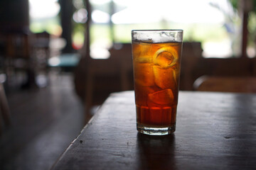 Fresh iced tea with blur background          