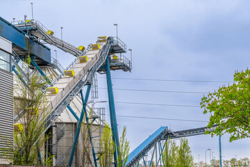 container at a recycling station against a clear sky. The concept of ecological use of resources