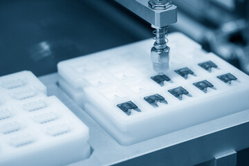 The hi-technology  robotic system collecting the automotive micro fuse.