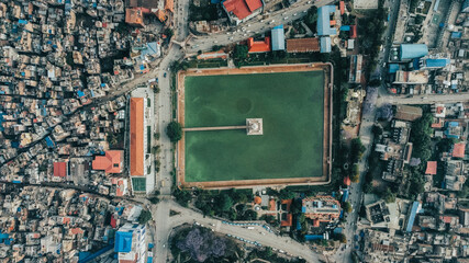 Aerial view of the Ranipokhari and buildings around in bright sunlight in Kathmandu, Nepal