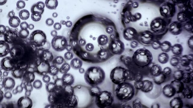 Salt Crystals Sodium polymer ion particles reaction to water bubble under a microscope
