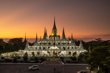 Sunset behind the Chedis (13 Stupas) Temple in Thailand  , Wat Asokaram  , Samut Prakan Province .  