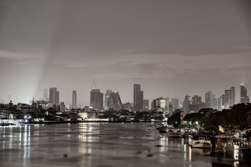 Fototapeta premium city at night , Chao Phraya river , Bangkok ,Thailand. 