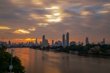 Fototapeta na wymiar city skyline at sunrise ( long exposure ) good moring Bangkok 