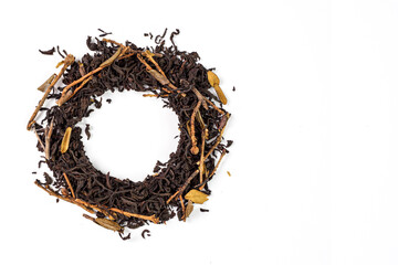 Black flavored tea. weight, loose, leaf tea on an isolated white background. The concept of the presentation of natural tea, the method of brewing, fermenting, drying, harvesting, the history of tea.