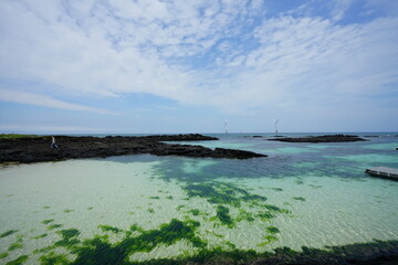 turbines on the sea and clear water