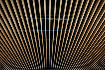 Low angle shot of a ceiling with wooden panels