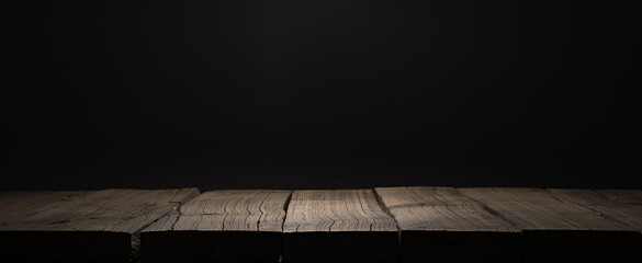 Wooden plank podium or table in the dark