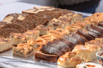 Traditional cakes and sweets during a celebration in Val Isarco, Dolomites