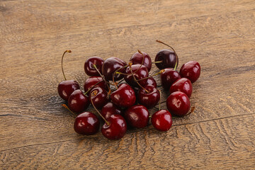 Ripe sweet cherry berries heap