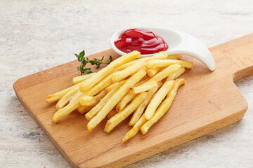 French fried potato over board