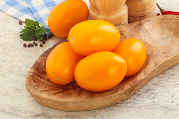 Sweet ripe yellow tomato in the bowl
