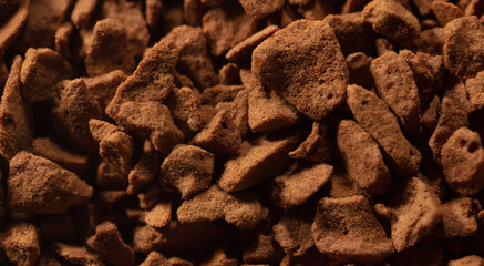 Instant coffee granules as background.