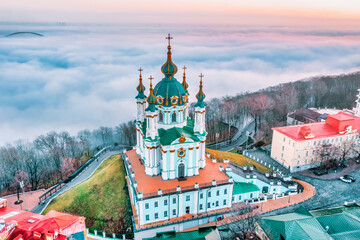 Aerial view of St. Andrew's Church in heavy fog, Kyiv, Ukraine. Concept, travel, tourism