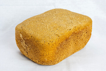 The freshly baked bread on a white background close-up. Making bread.