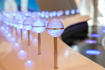 light balls with luminance light on a silver pole gaming out of focus with grain