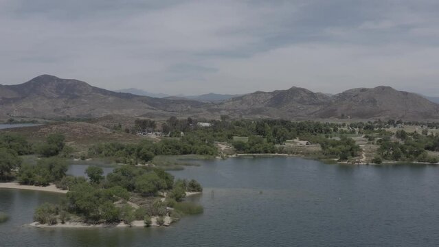 A beautiful aerial drone shot, drone flying towards the mountain lines in Lake Skinner - Temecula - Riverside County - California