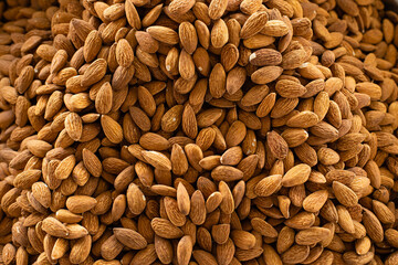 Background of raw peeled almonds, panoramic view