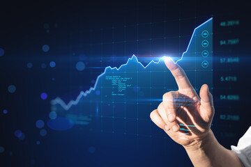 Stock market profit increase concept with man finger touching virtual screen with growing financial market graph