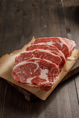 raw beef meat on a cutting board