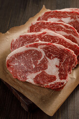 raw beef meat on a cutting board