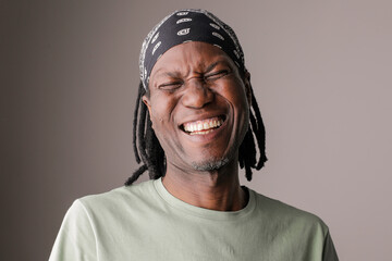 African, handsome man isolated on a background smiling