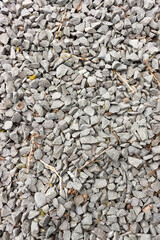 lying gray gravel in gravel small branches
