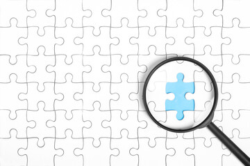 jigsaw puzzle pattern missing piece with a magnifying glass. Top view pattern to express alliance...