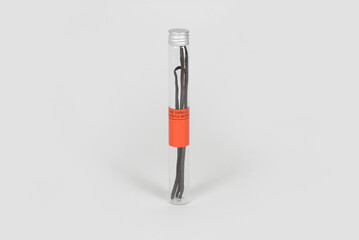 Gousses de vanille dans tube en verre