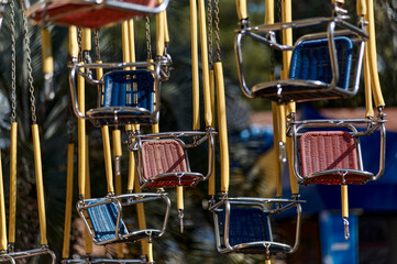 Empty carousel in summer amusement park