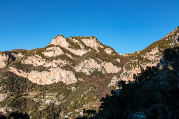 Fototapeta na wymiar Scenic view on Monte Gambera from Montepertuso Il Buco on hiking trail Path of Gods between Positano and Praiano, Amalfi Coast, Campania, Italy, Europe. Hole in a cliff rock at the Mediterranean Sea