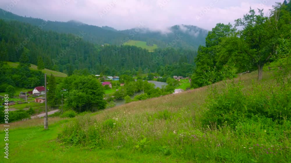 Sticker The cloudy rainy day in Carpathians, Dzembronia village, Ukraine