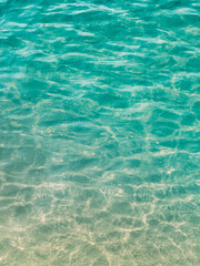 Surface transparent blue sea water.