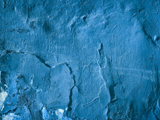 Naklejka premium Old cracked paint on the concrete wall.