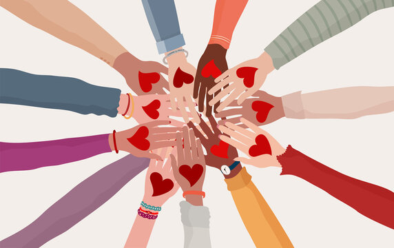 Palms up of group of diverse people in circle with heart in hand. Charity donation and volunteer work. Support and assistance. Multicultural and multiethnic community. People diversity