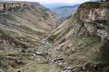beautiful mountain peaks are buried in clouds and surrounded by winding mountain roads