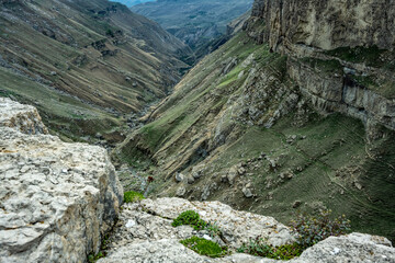 beautiful mountain peaks are buried in clouds and surrounded by winding mountain roads