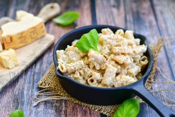   Gluten free Chickpea pasta.Fresh  low carb  high protein pasta rigatoni alla carbonara with  cream sauce  , becon  egg, parmesan cheese ,olive oil and black pepper) 