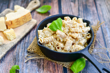   Gluten free Chickpea pasta.Fresh  low carb  high protein pasta rigatoni alla carbonara with  cream sauce  , becon  egg, parmesan cheese ,olive oil and black pepper) 