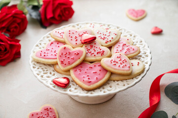 Heart cookies. Homemade butter cookies with pink glaze and sprinkles.
