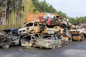 Civil cars shot and burned up by Russian soldiers, Ukraine